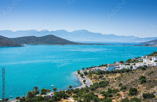 Fototapeta Naklejka Na Ścianę i Meble -  Panoramic view of the town Elounda, Crete, Greece.Paradice view of Crete island with blue water. Panoramic view of Elounda nature