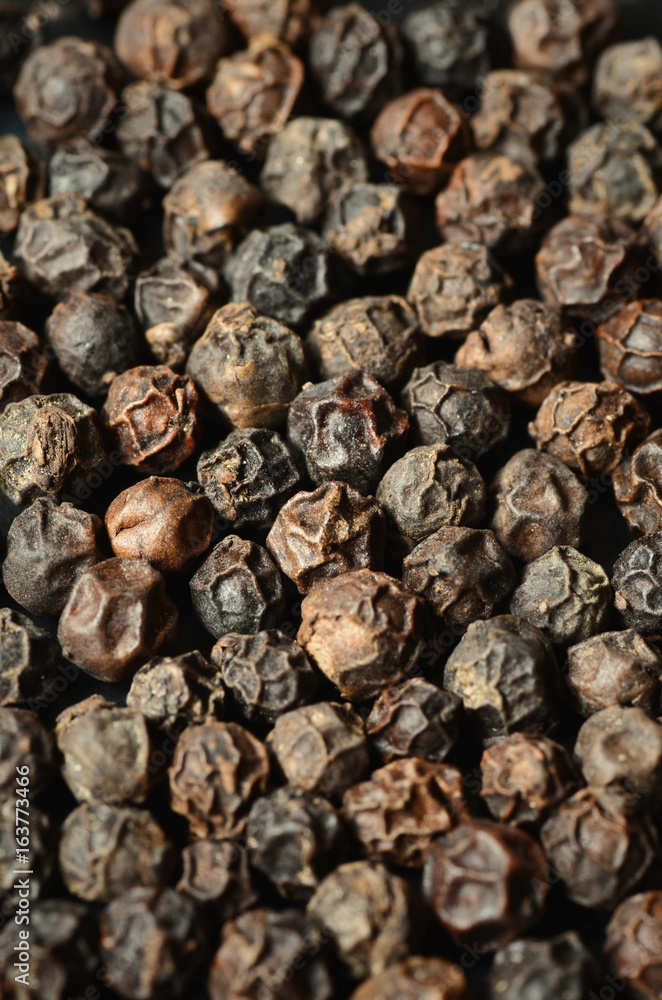 Close-up of black peppercorns Close-up of black peppercorns