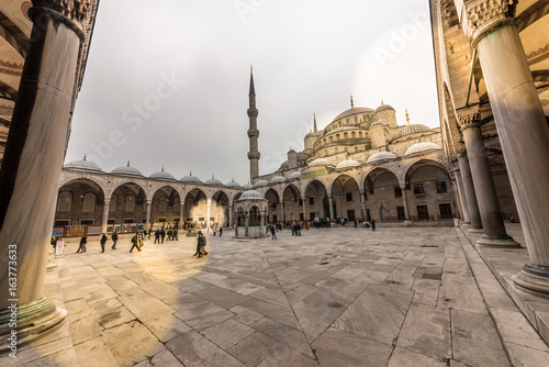 View from the outside,inner courtyard and archway of blue Mosque also called Sultan Ahmed Mosque or Sultan Ahmet Mosque in Istanbul, Turkey