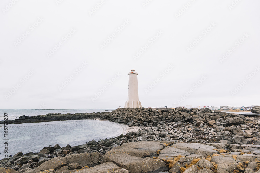 Old Akranes lighthouse in Iceland on the edge of the cliff