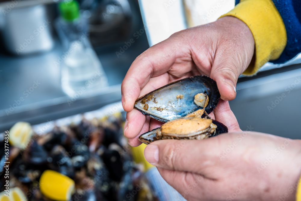 Turkish style appetizer street food stuffed mussels called midye dolma
