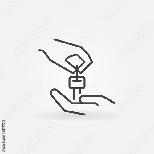 Hands with car key icon