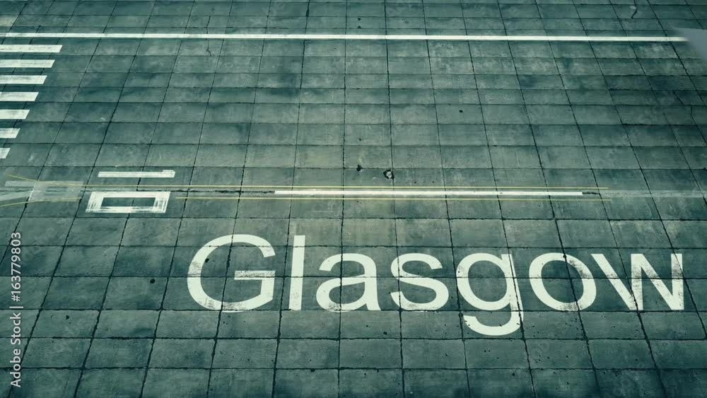 Aerial view of big airplane arriving to Glasgow airport. Travel to the United Kingdom conceptual intro animation Aerial view of big airplane arriving to Glasgow airport. Travel to the United Kingdom conceptual intro animation