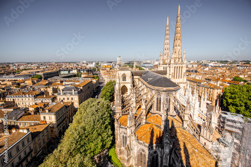 Fototapeta Naklejka Na Ścianę i Meble -  Aerial cityscape view on the old town of Bordeaux city with saint Pierre cathedral during the sunny day in France
