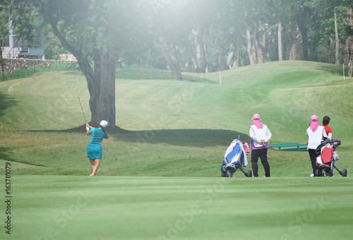 Women play golf as a profession that requires patience with the sun, the pressure of competitors.