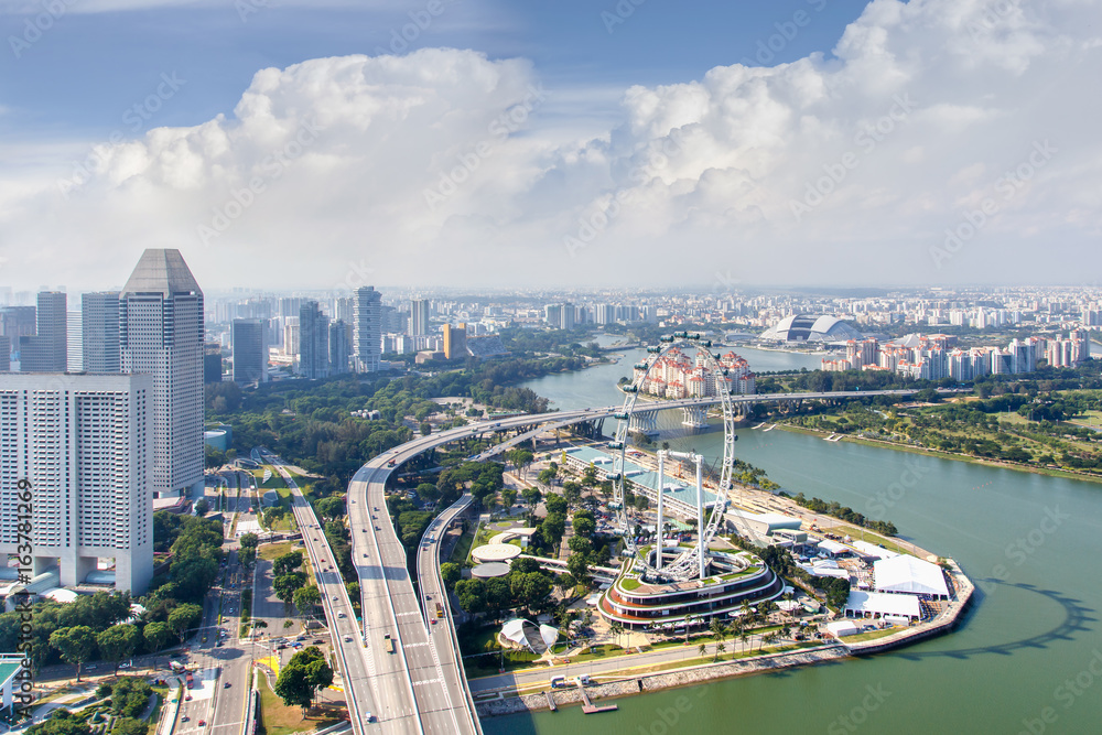 Top views skyline business building and financial district in sunshine day at Singapore City Top views skyline business building and financial district in sunshine day at Singapore City