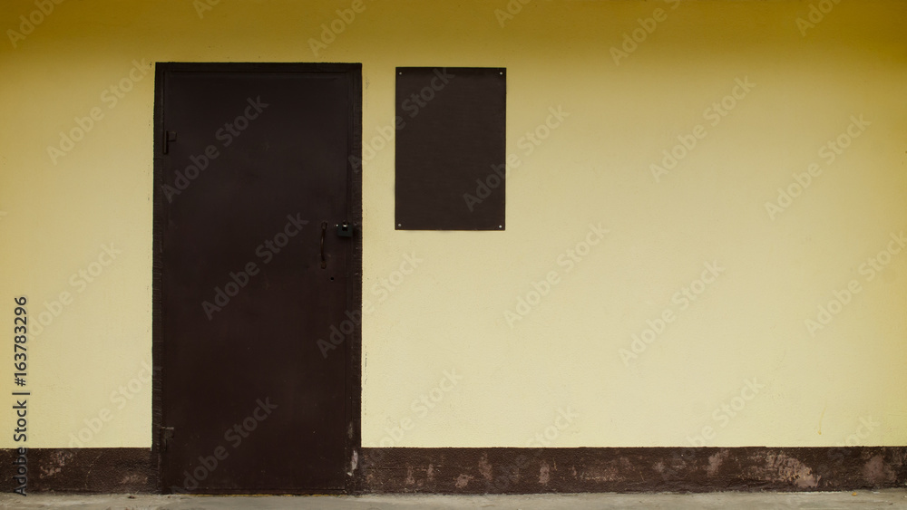 Yellow wall with door minimalism