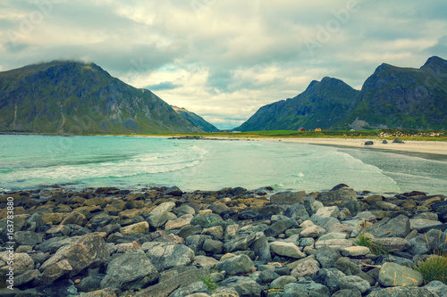 Rocky seashore with a beautiful cloudy sky. Wilderness. Beautiful nature Norway. Lofoten islands. Ramberg