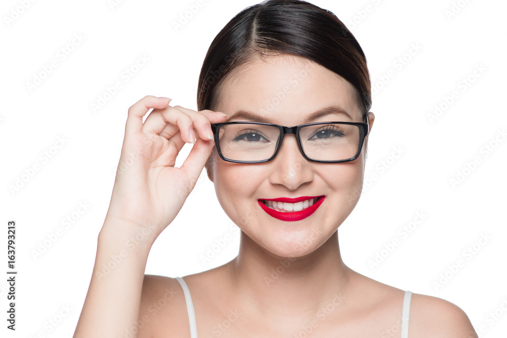 Beauty asian model girl with perfect skin wearing glasses, isolated on white background. Beauty asian model girl with perfect skin wearing glasses, isolated on white background.