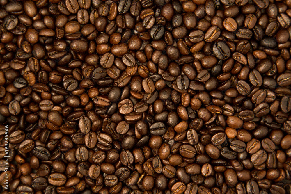 Roasted coffee bean groups use for background. Roasted coffee bean groups use for background.