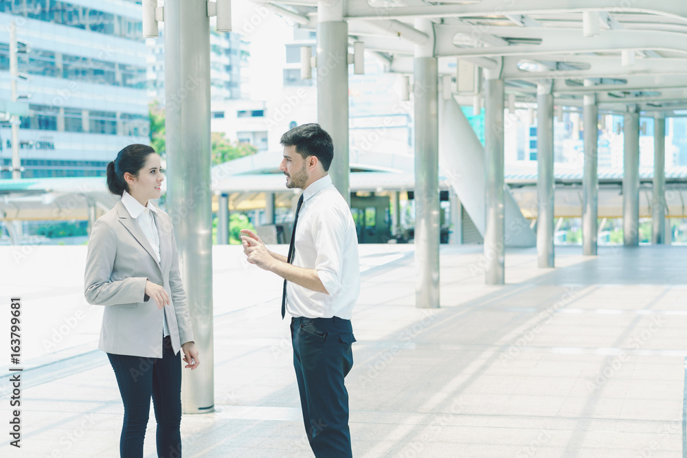 Business woman ask for advice from man colleagues, young male and female entrepreneurs working together. Business woman ask for advice from man colleagues, young male and female entrepreneurs working together.