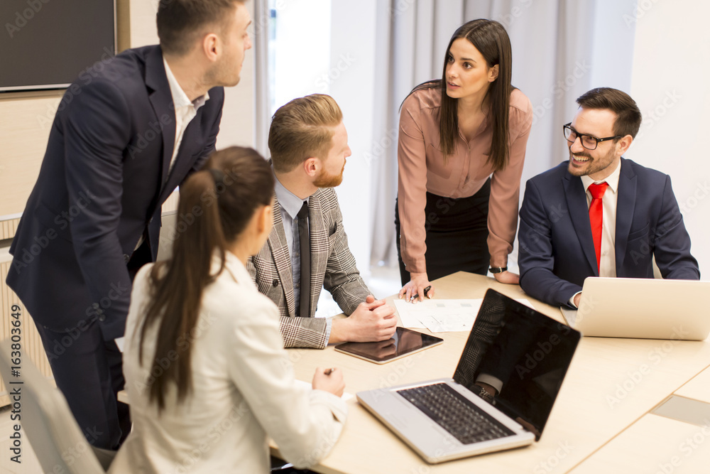 Young people have teamwork in the office Young people have teamwork in the office