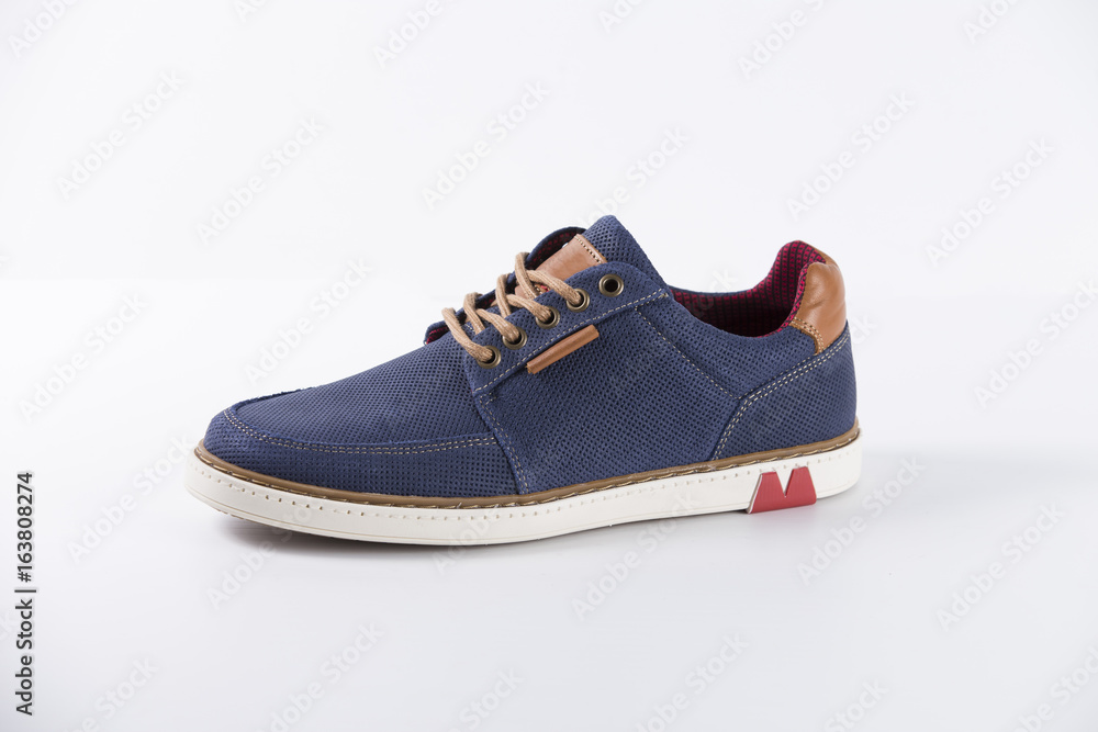 Male Blue Shoe on white Background, Top View, studio. Male Blue Shoe on white Background, Top View, studio.
