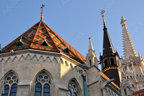 Matthiaskirche auf dem Schlossberg vor strahlend blauem wolkenlosen Himmel photo