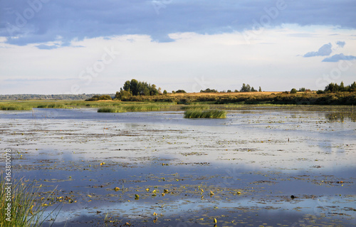 Fototapeta Naklejka Na Ścianę i Meble -  Beautiful landscape of the lake before the rain