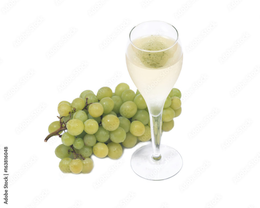 Glass of white wine and ripe organic green grapes isolated on white background Glass of white wine and ripe organic green grapes isolated on white background