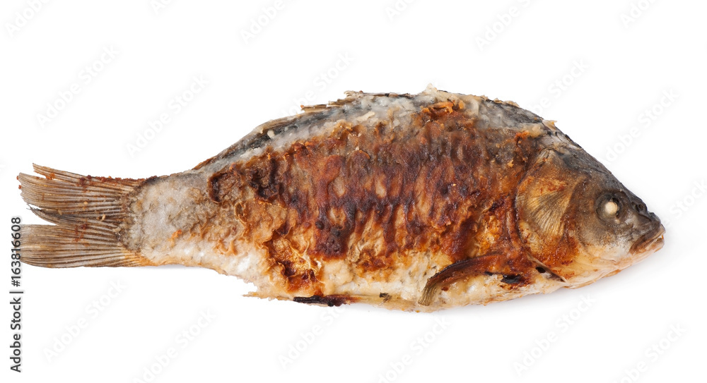 Fried river fish carp isolated on white background, top view. Fried river fish carp isolated on white background, top view.