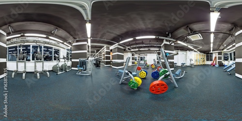 Empty big modern fitness gym with sport equipment full 360 degree panorama in equirectangular spherical projection photo
