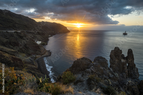 Sunset over the rocky coast of atlantic