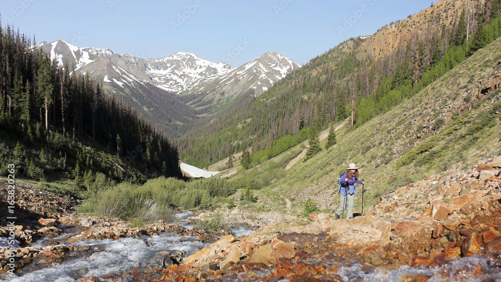 A Woman Hikes the Silver Creek Trail