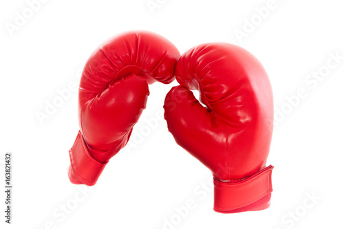 Used pair of (brandless) red boxing gloves, isolated on white (1 of 1).