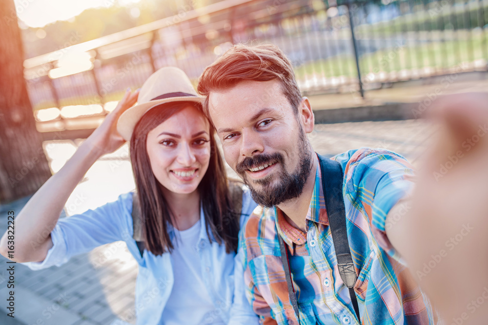 Couple tourist traveling and using map/Couple tourist exploring city. Couple tourist traveling and using map/Couple tourist exploring city.