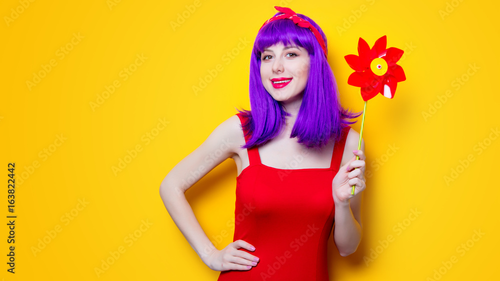 girl with pinwheel toy girl with pinwheel toy