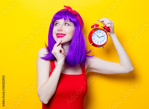 girl with purple color hair and alarm clock