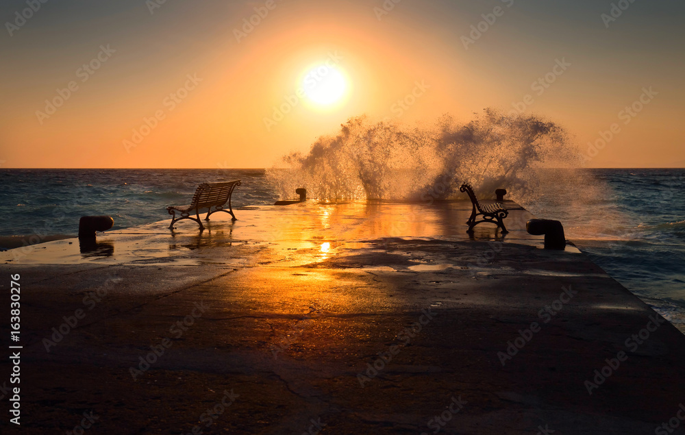  Sunset on the Mediterranean sea during a storm .