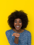 black woman isolated on a Yellow background