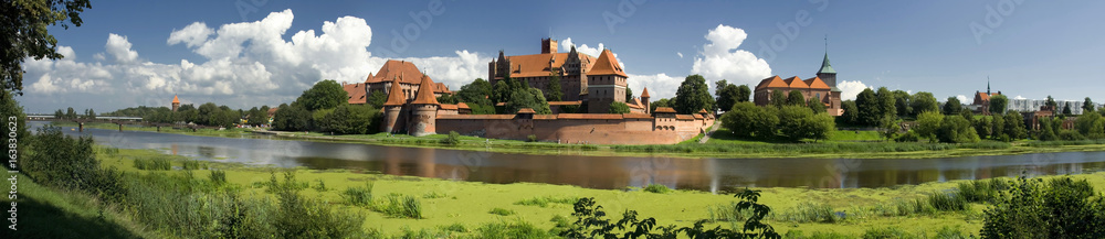 View across the river to the old fortress of the Teutonic Order in Malbork