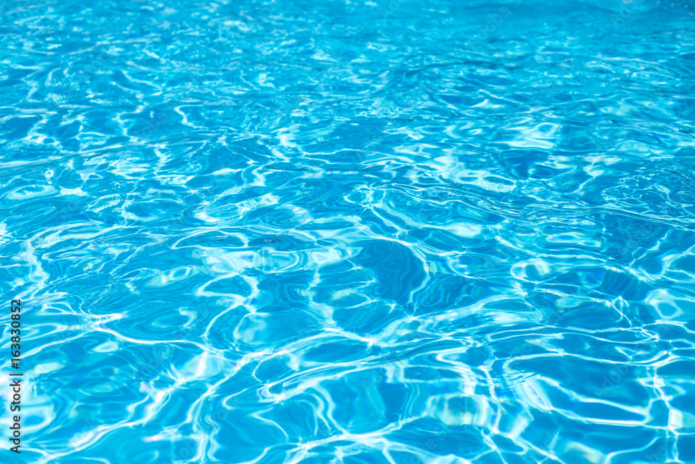 swimming pool with ripple turquoise water background