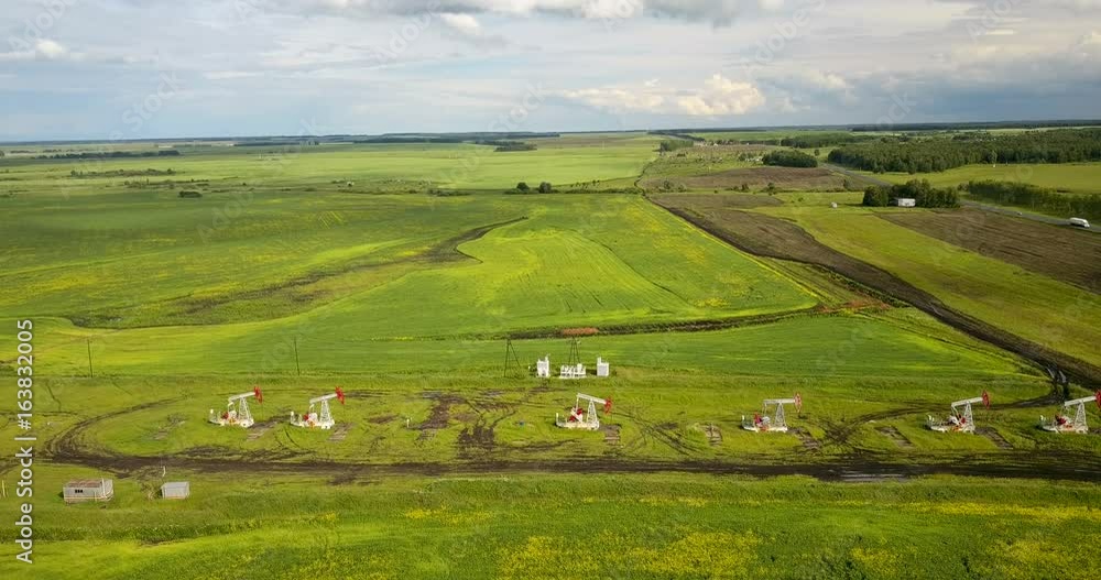 Oil pumping stations in operation aerial view Oil pumping stations in operation aerial view