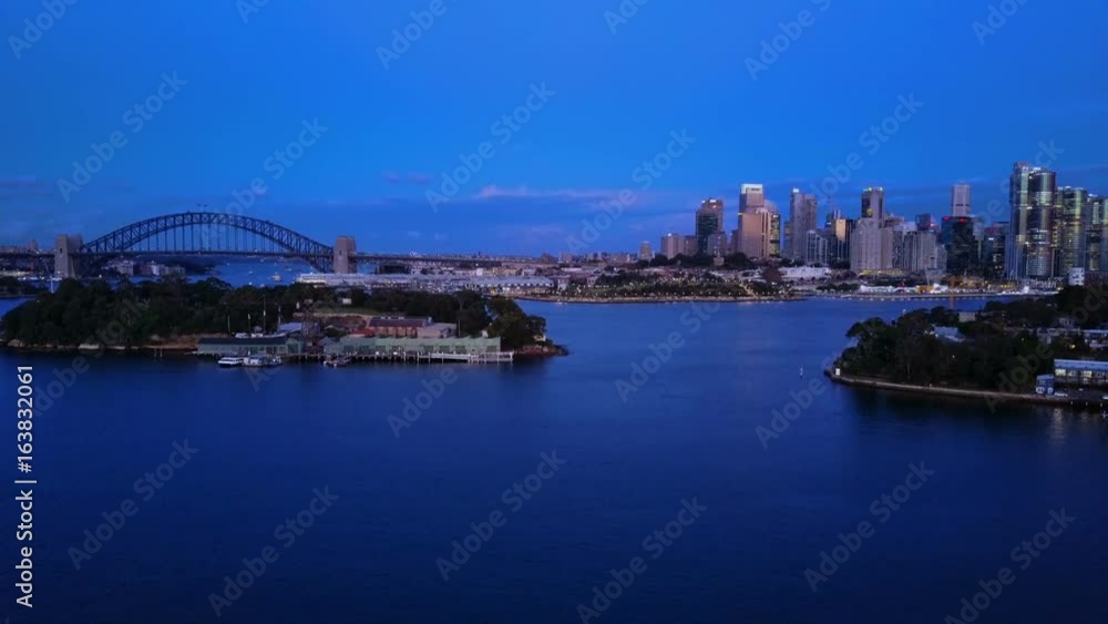 Aerial video of Sydney Harbour at night, with view of Harbour Bridge, Opera House and skyline of CBD Aerial video of Sydney Harbour at night, with view of Harbour Bridge, Opera House and skyline of CBD