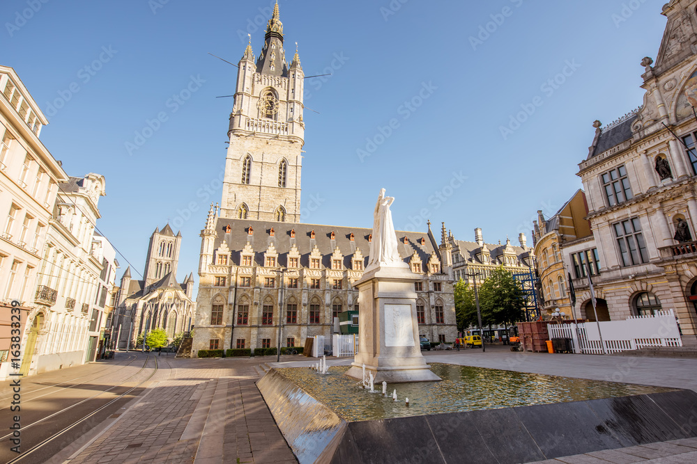 Morning view on the saint Bavo square with fountain in the old town of Gent city, Belgium