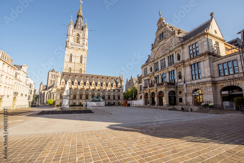 Morning view on the saint Bavo square with fountain in the old town of Gent city, Belgium