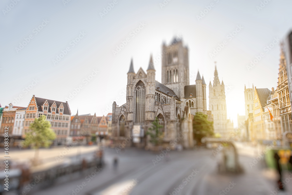 Obraz premium CItyscape view on the saint Nicholas church during the morning in Gent old town, Belgium. Tilt-shift image technic