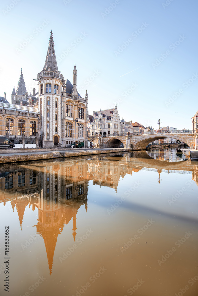 Morning view on the old town with beautiful reflection in the water channel in Gent city, Belgium