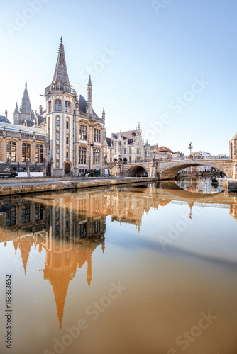 Morning view on the old town with beautiful reflection in the water channel in Gent city, Belgium