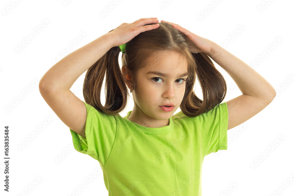 cute little girl with pigtails in green shirt cute little girl with pigtails in green shirt