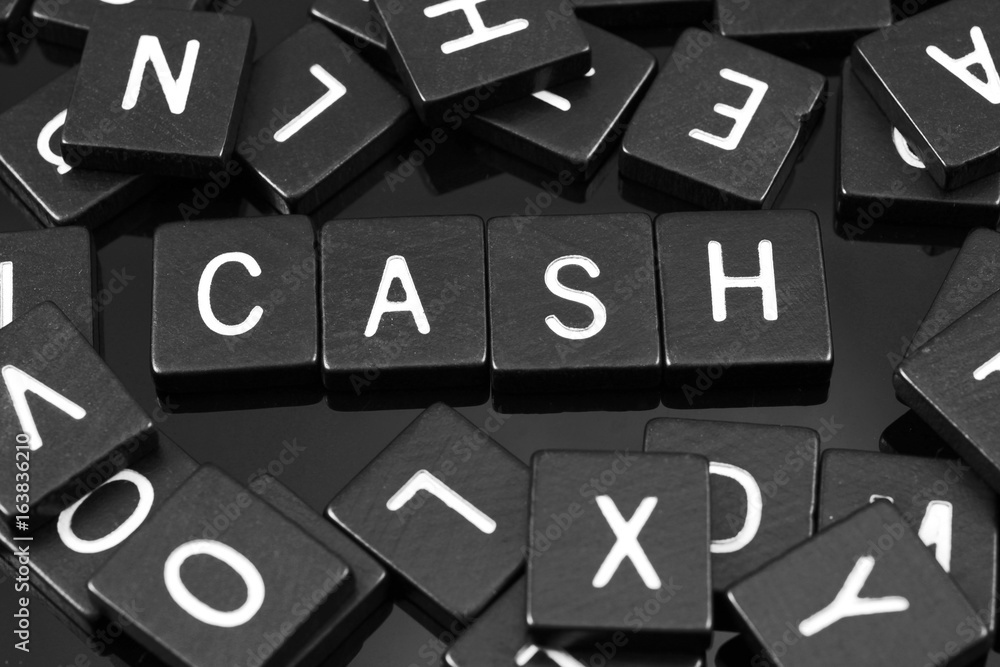 Black letter tiles spelling the word 