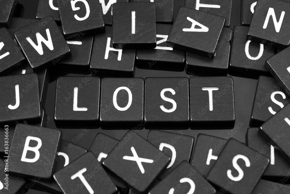 Black letter tiles spelling the word Black letter tiles spelling the word