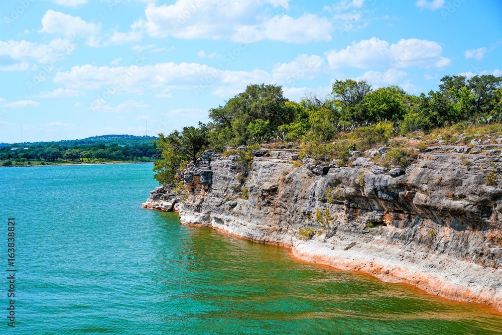 Lake Travis in Texas has some incredible cliffs on the edge of the lake to climb or jump into the water from.