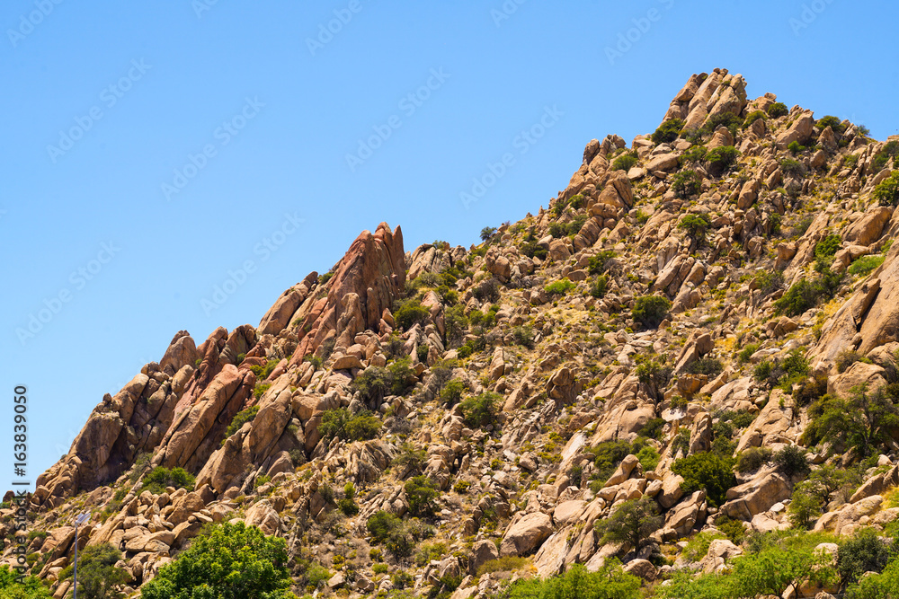 The stones on the mountain fit together like a very complicated puzzle. The stones on the mountain fit together like a very complicated puzzle.