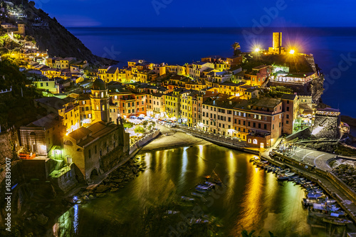 Italy. Cinque Terre (UNESCO World Heritage Site since 1997). Vernazza town by night (Liguria region)