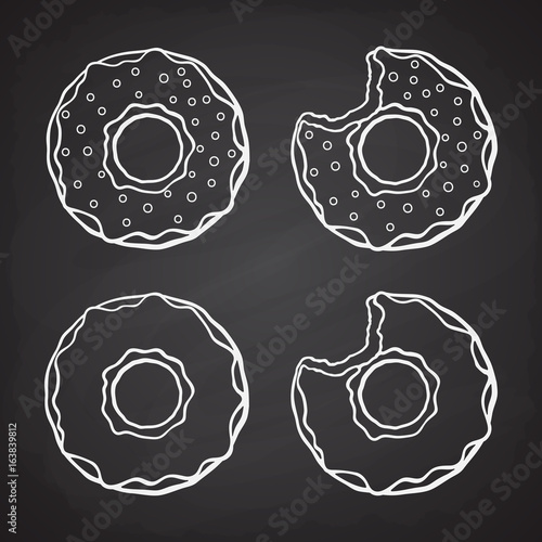 Hand drawn doodles of donuts with glaze and sugar dragees and bitten donuts. Vector illustration set. Desserts and sweets. Cartoon sketch.  Design elements for menus, signboards, showcases
