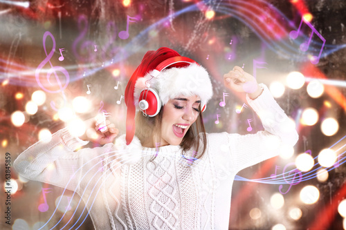 Young woman with headphones...