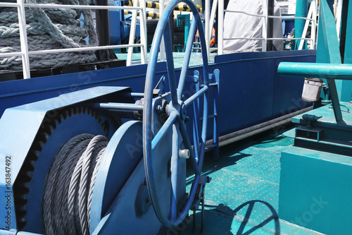 Foto Drum with hawser on deck of vessel in sunny day