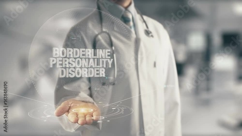 Doctor holding in hand Borderline Personality Disorder photo