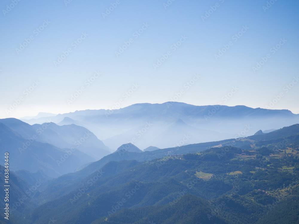 Morning mist over Pyrenees hills